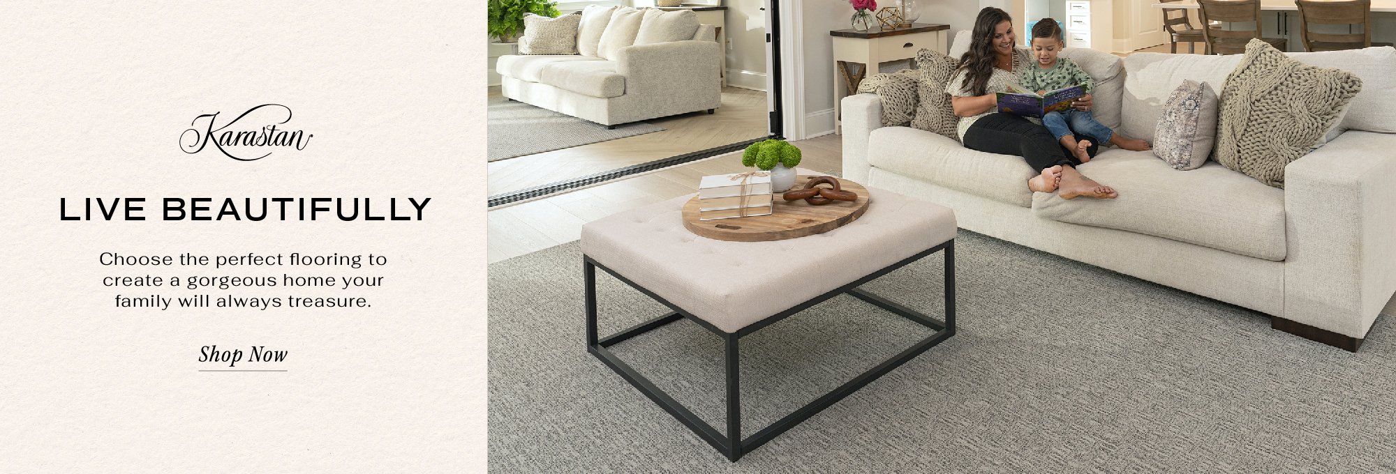 Karastan Carpet flooring promotion featuring a mother and child on a light sofa in a bright living room